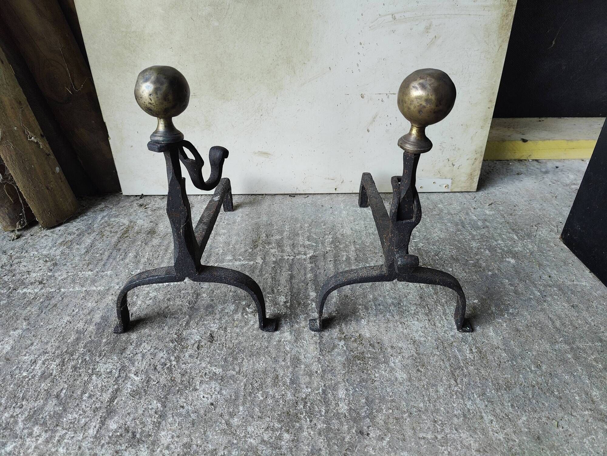 Pair of fire dogs - wrought iron and brass