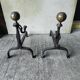Pair of fire dogs - wrought iron and brass