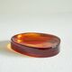 Concave glass catchall from the 1960s.