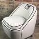 Fauteuil rétro vintage 80's en velours blanc gansé noir