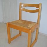 Chair made of solid elm, with a straw seat.