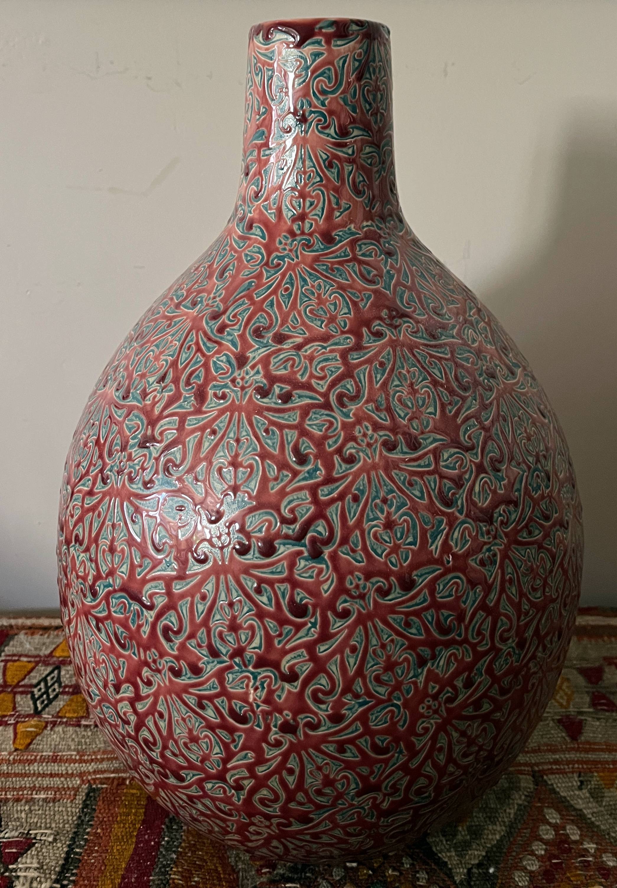 Large ceramic art vase with signed enamel interlacing