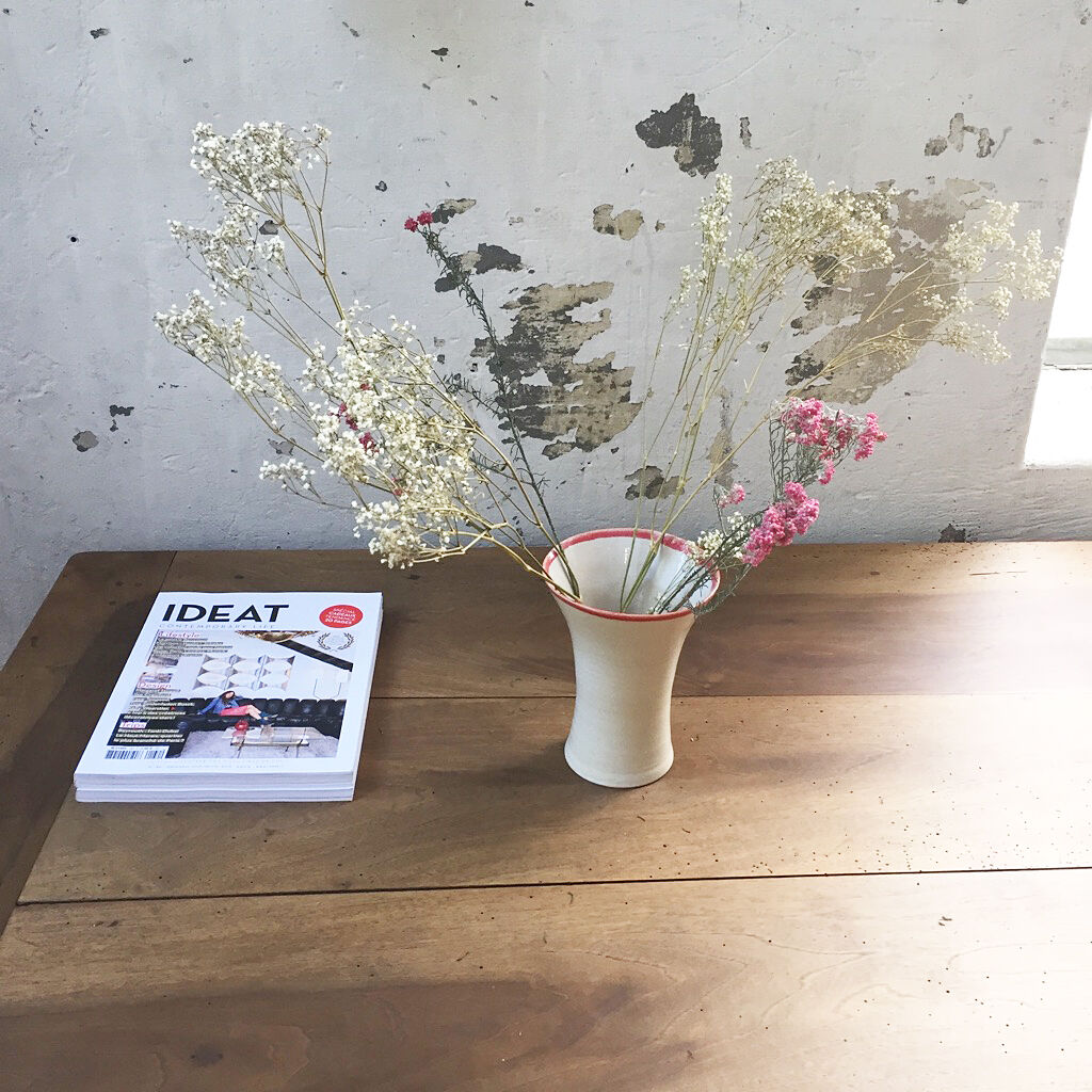 Flared white ceramic vase