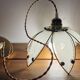 Glass flower rimmed with brass