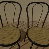 4 Chaises bistrot en métal noir et assise cannage plastique