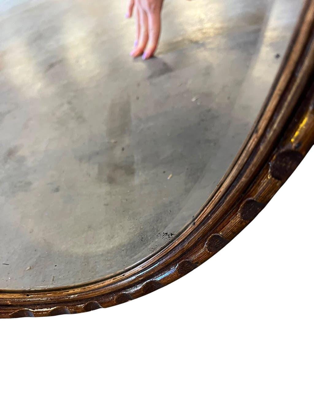 Robust vintage oval wall mirror in wood
