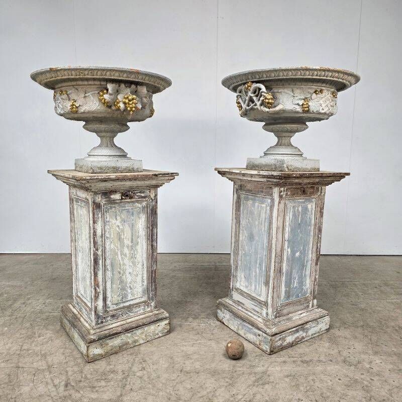 Large pair of 19th-century cast iron basins with vine decoration.