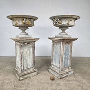 Large pair of 19th-century cast iron basins with vine decoration.