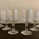 6 glasses on foot in engraved and blown crystal, height 12.5 cm