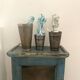 Small wall display case in blue lacquered teak
