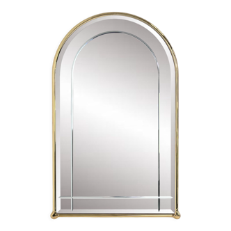 Beveled mirror and brass contour arch