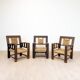 3 fauteuils néo-basques sculptés en paille et chêne, années 1940