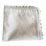 Une housse de coussin dentelle à la main