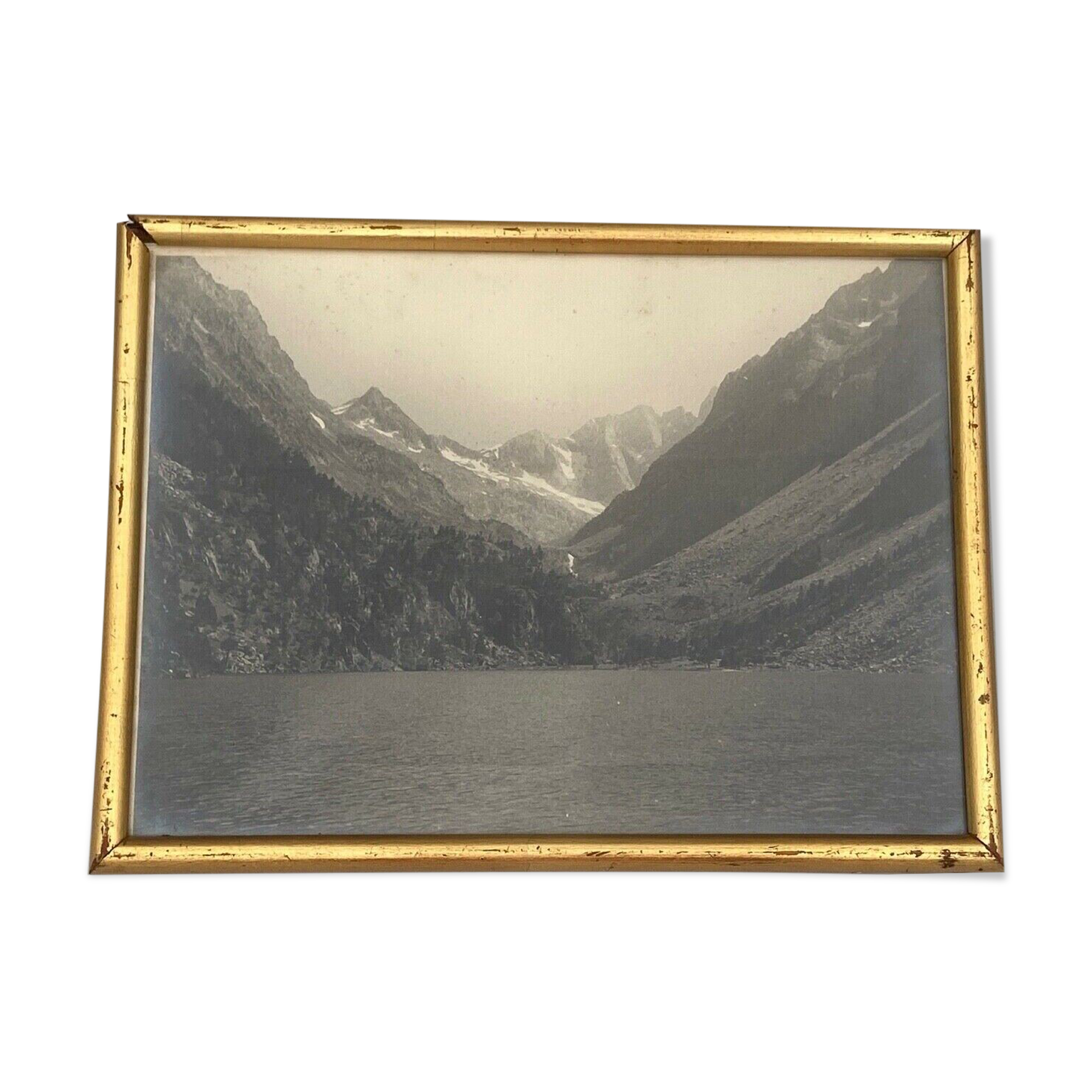 Photo in black and white mountain lake in golden frame