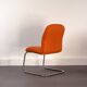 Chrome-plated steel and orange fabric armchair, Germany, 1980