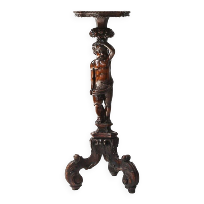 Table piédestal en noyer sculpté avec putto, France années 1850