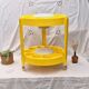 Serving trolley for drinks in yellow plastic, space age 1970.