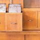 Vintage haberdashery grocery cabinet old shop interior, 1950s