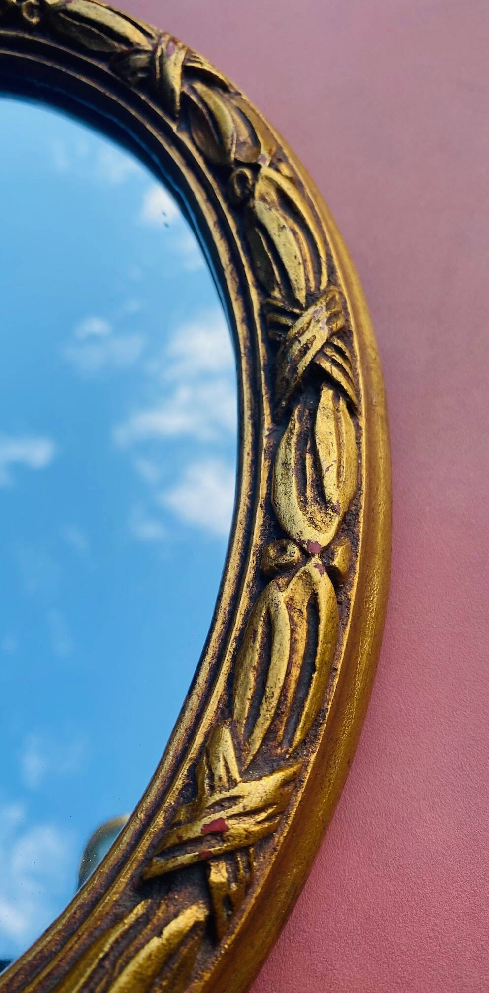 Small antique oval gilt mirror