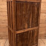 Art Deco glass-fronted cabinet in Burmese teak with original patina.