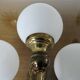 Triple "Hollywood Regency" wall light in brass and opaline, 1970