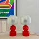 Pair of bright red glass "Globes" bedside lamps, 1960