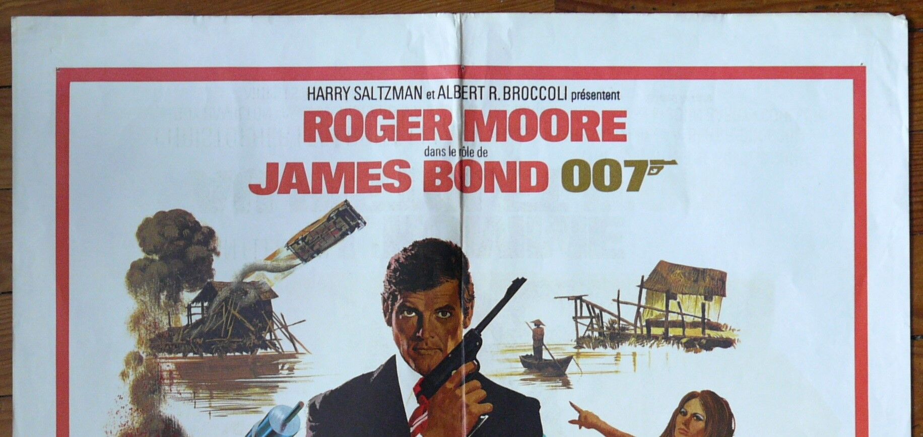 Displays original movie "the man with the golden gun" james bond 007