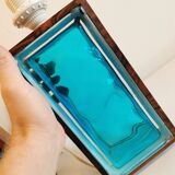 Two Swedish table lamps in solid pressed blue glass and teak wood "frame".