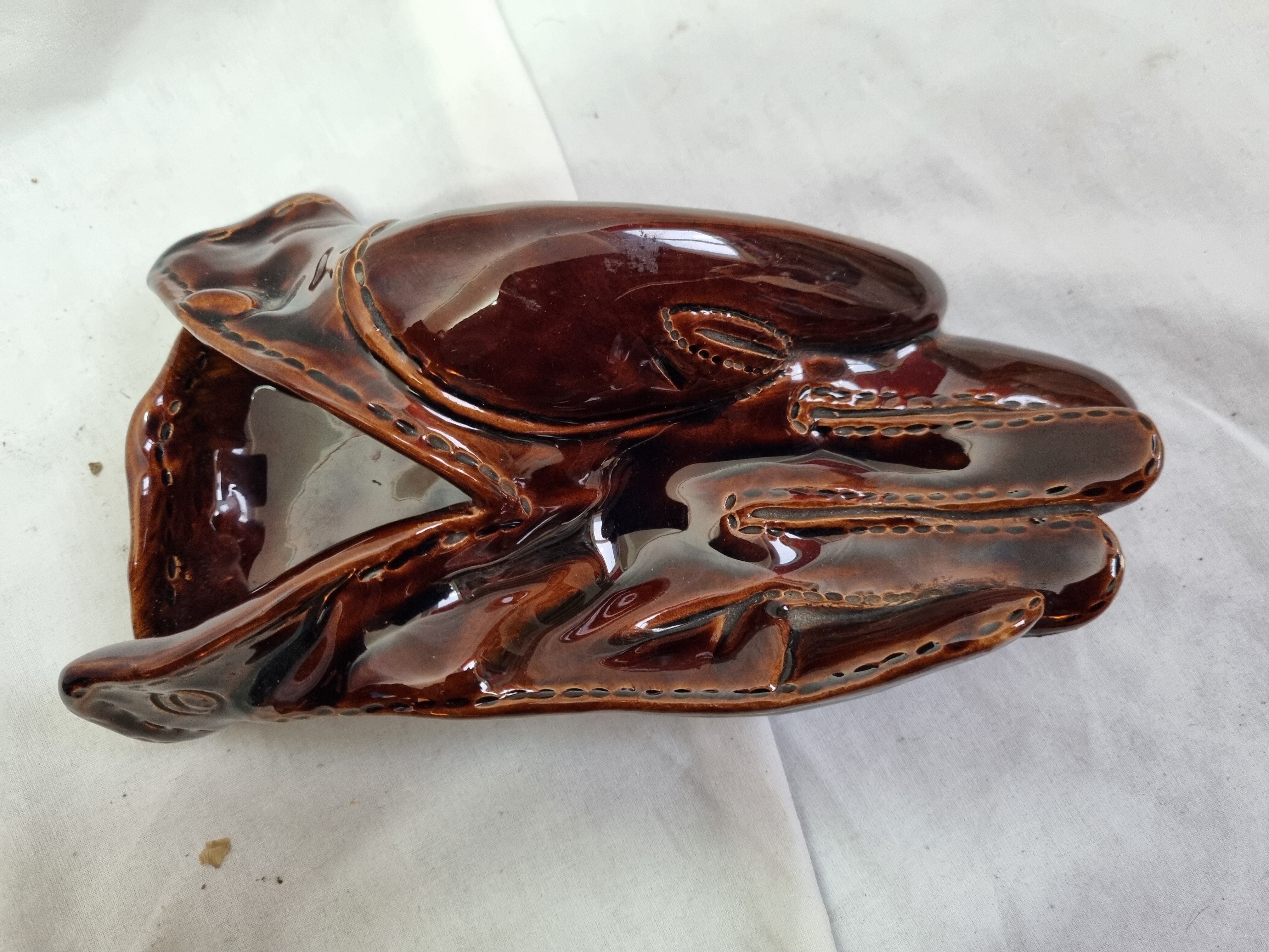 Ceramic ashtray in the shape of a glove from 1970