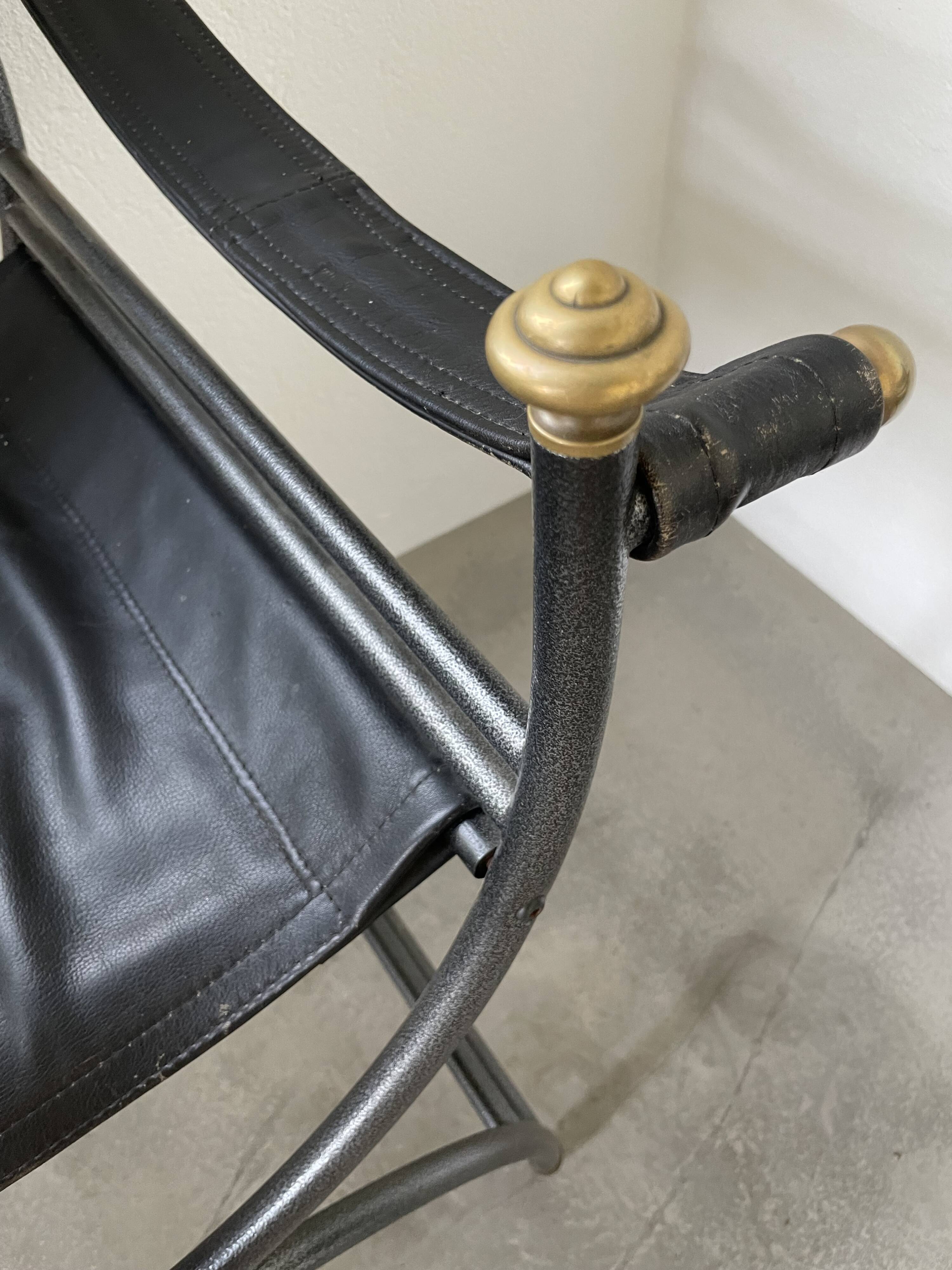 Pair of leather “curule” emperor armchairs