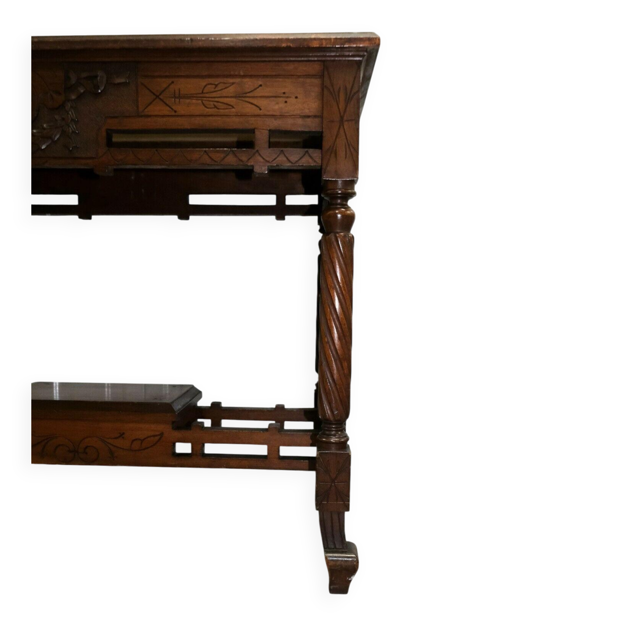 19th-century carved walnut desk with a leather top.