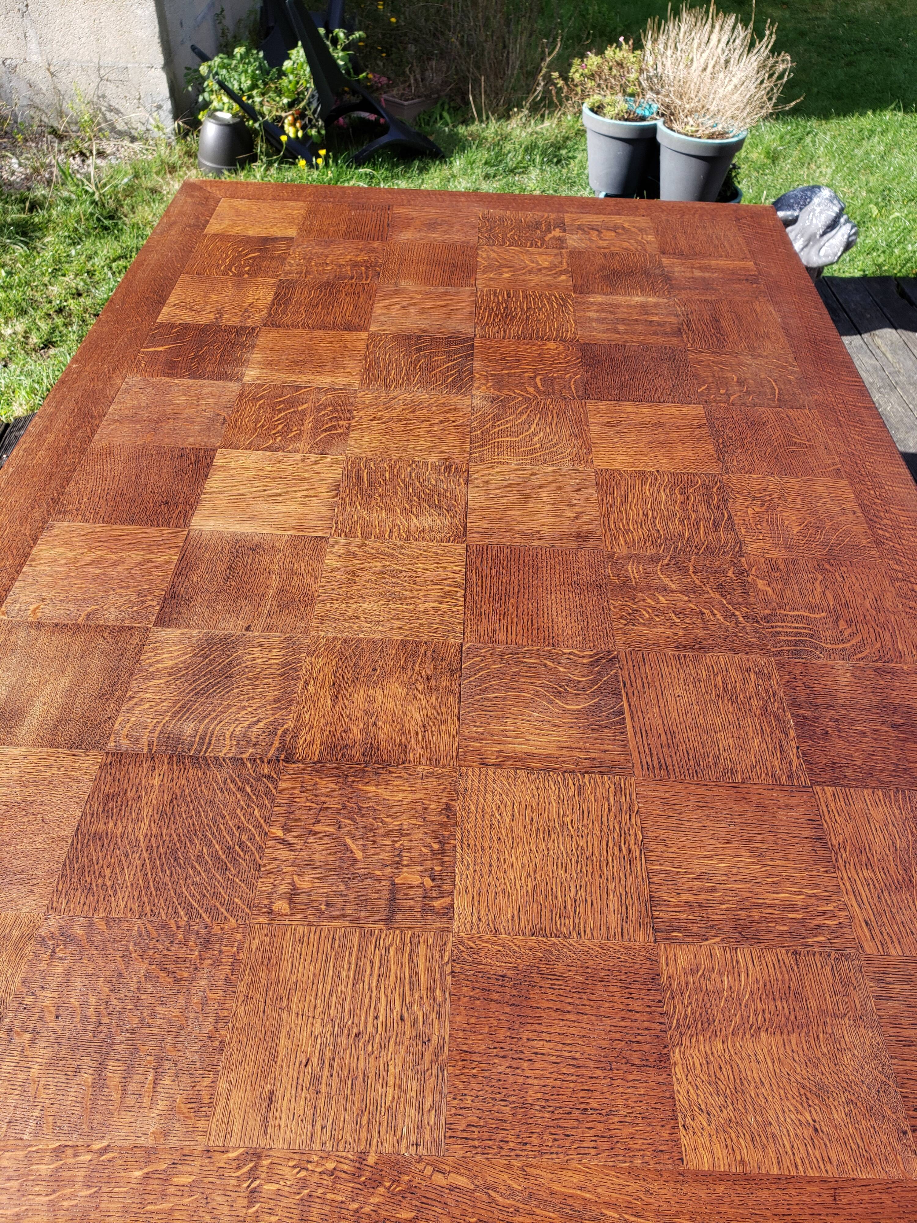 1910s Jacobean style solid oak extending drawer dining table
