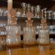 Set of 3 vintage pink glass bottles with corks.