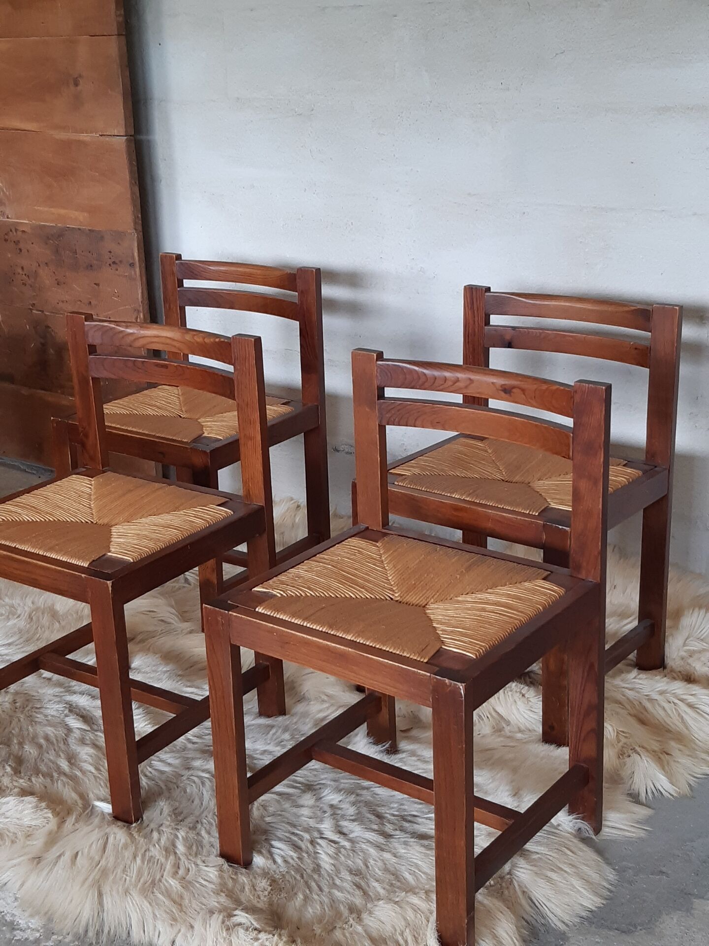 4 straw chairs.