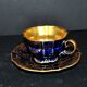 A precious, multi-lobed cup in German cobalt porcelain with a gold interior, Lindner Bavaria.