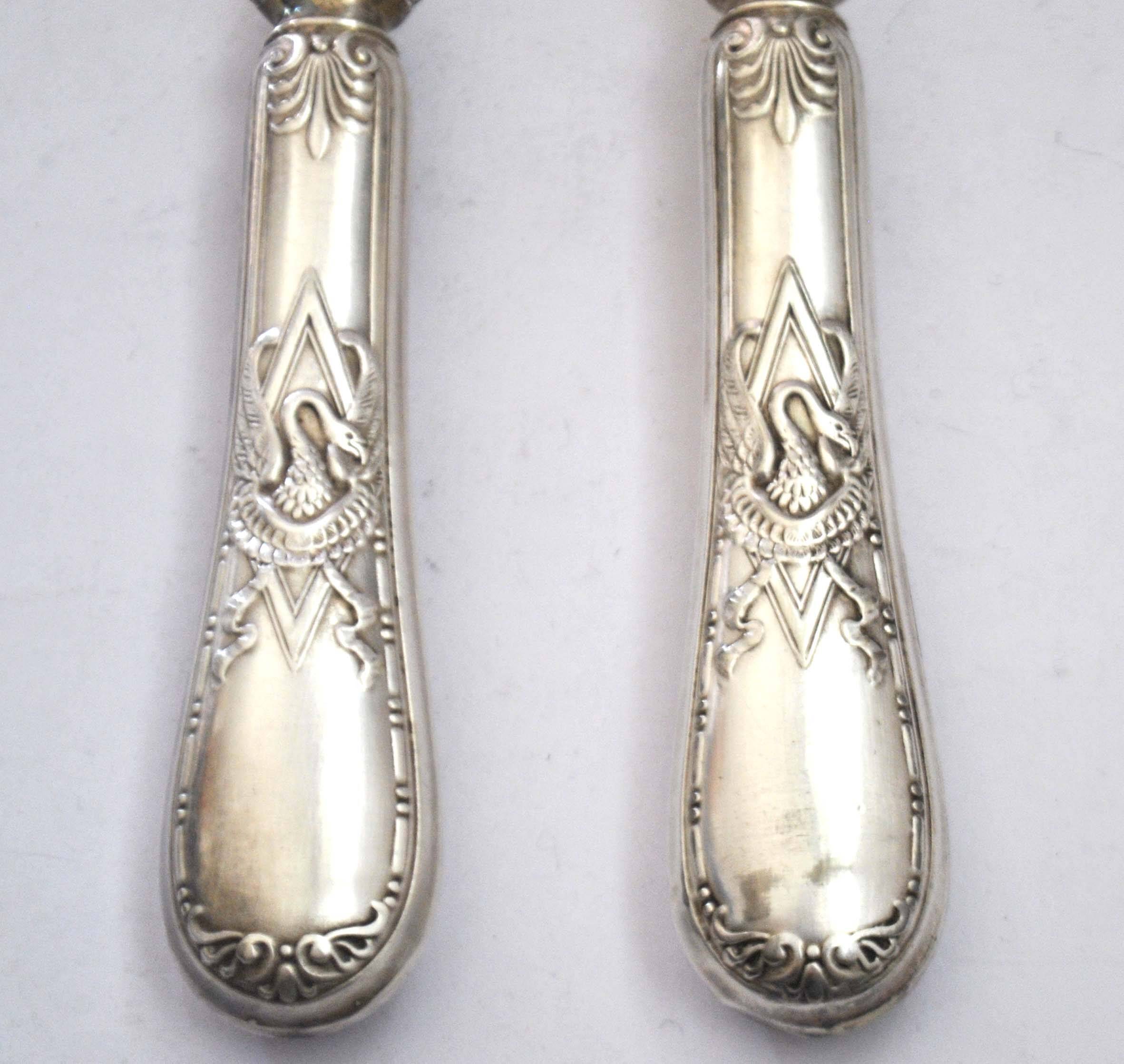 Empire salad server decorated with a swan and napoleon palmette, 19th century.