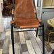 Pair of Metal and Leather Chairs, after Charlotte Perriand for Les Arcs, circa 1960.