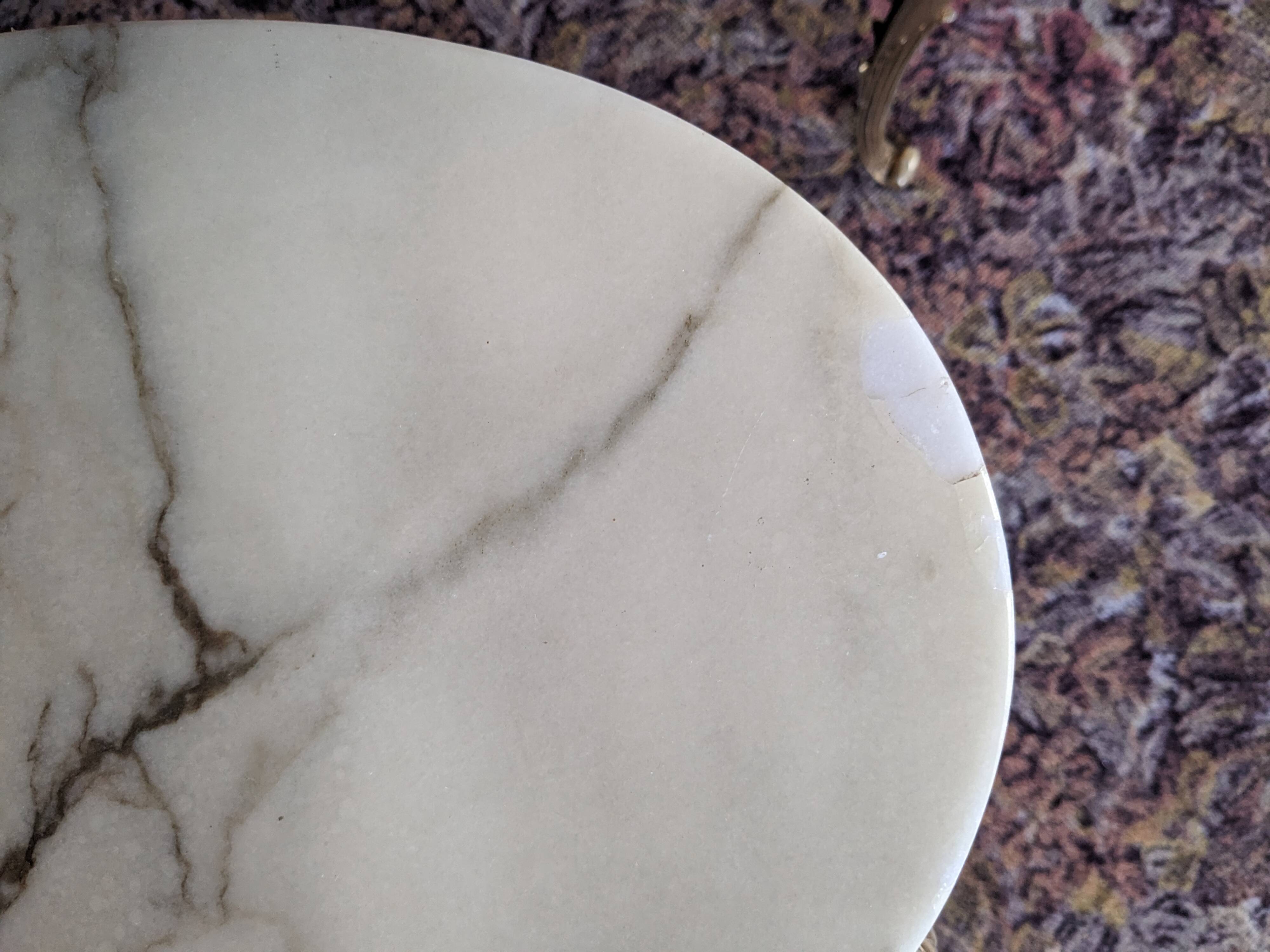 Nesting tables in white marble and bronze