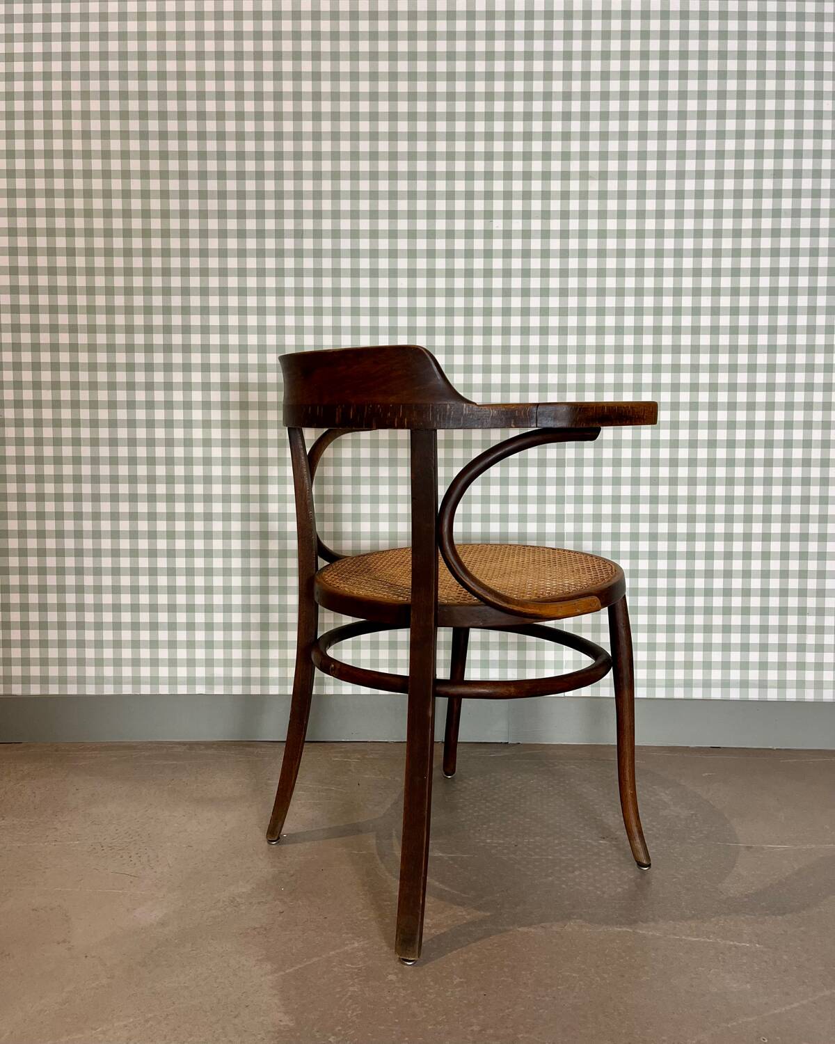Baumann armchair in curved wood and canework