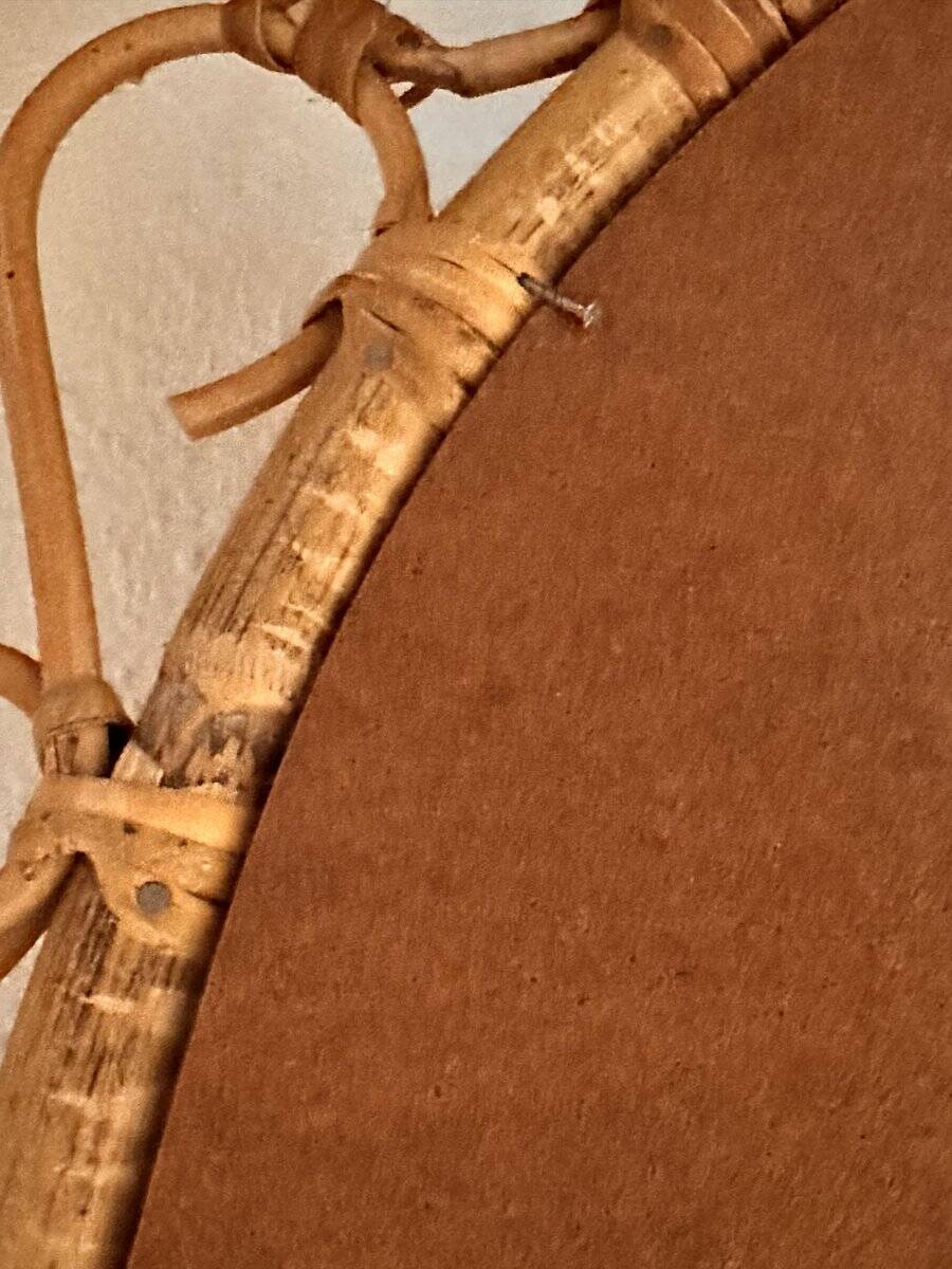 French circular sun-shaped mirror in rattan with knots, 1950s.