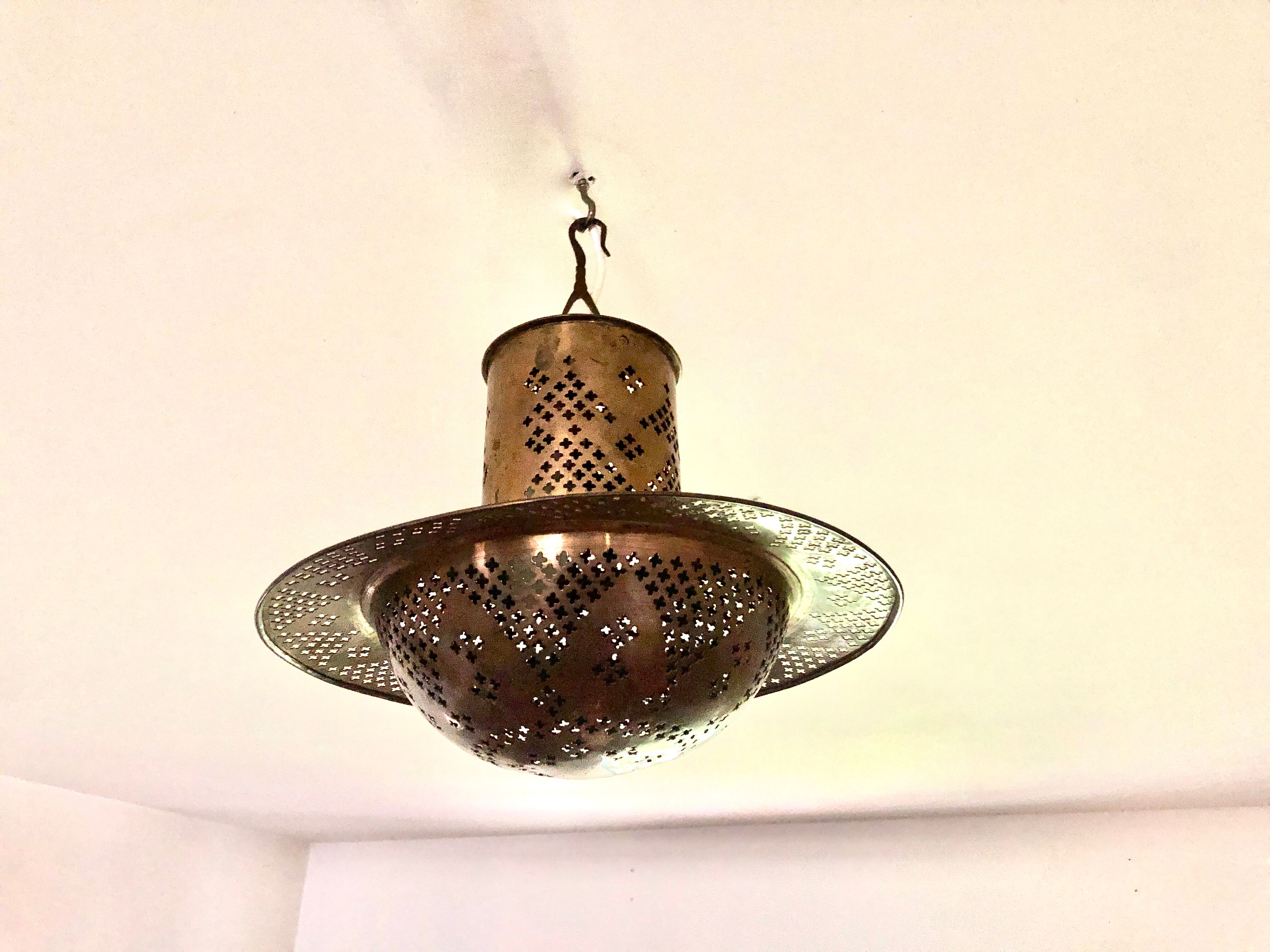 Perforated gilded metal lantern