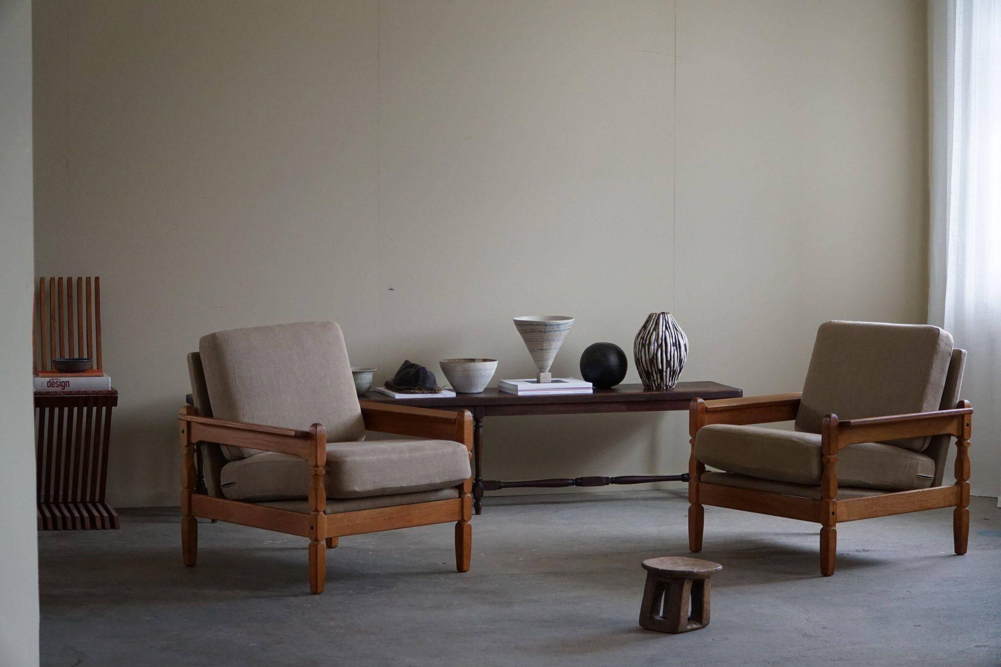 Modern Danish, Pair of Lounge Armchairs in Oak and Linen, Henning Kjærnulf, 1960s