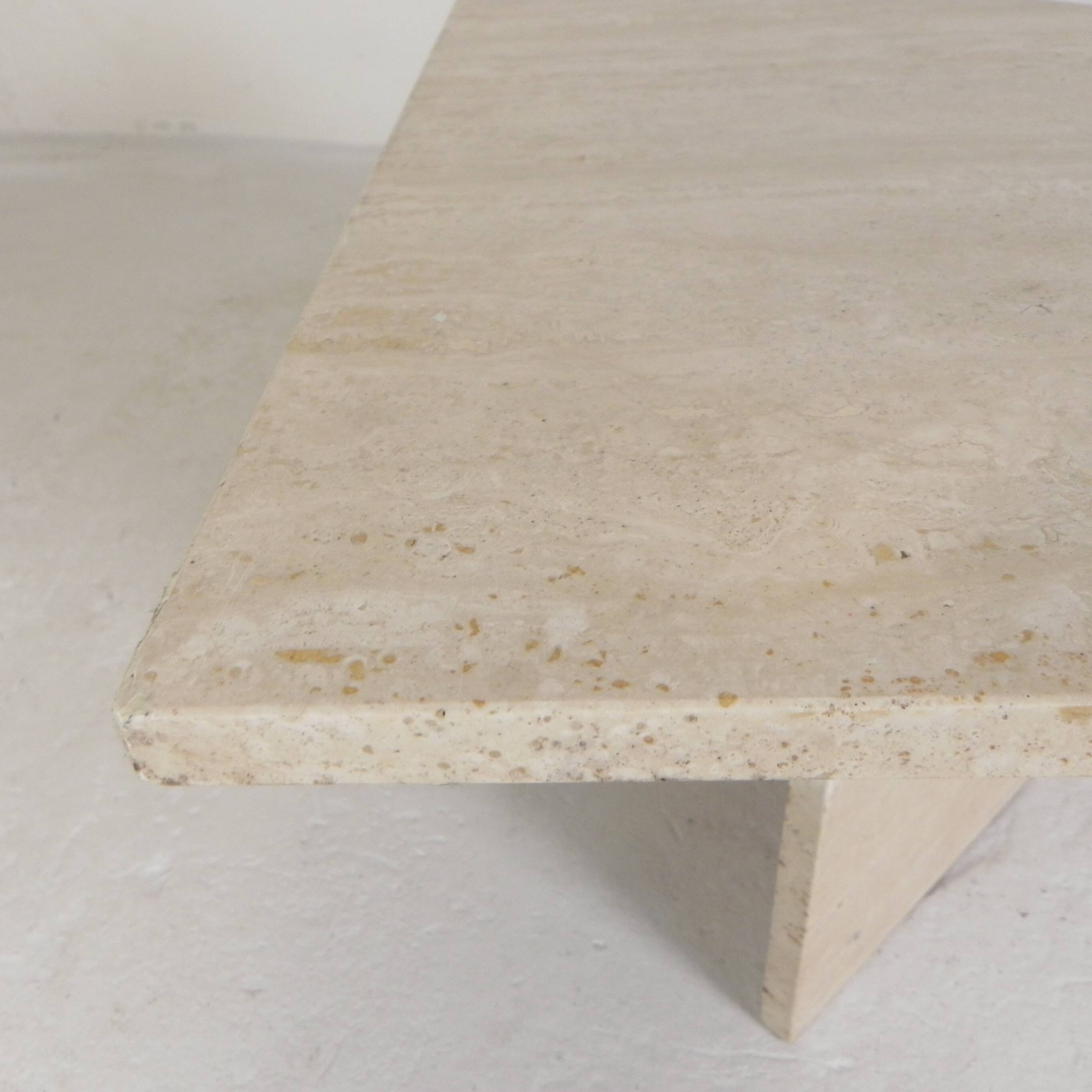 Mid-Century travertine coffee table with a triangular top, 1970s.