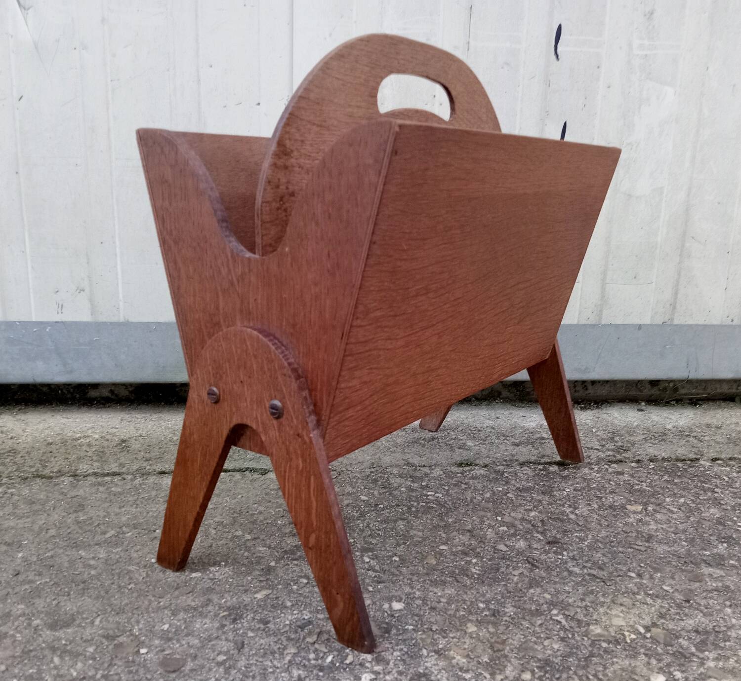 Vintage magazine rack with compass feet
