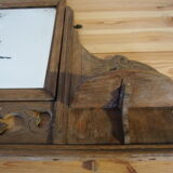 Old carved wooden pediment mirror