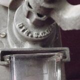 Old wall-mounted coffee grinder