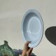 Round, flat, sky-blue ceramic salad bowl from Moulin des Loups