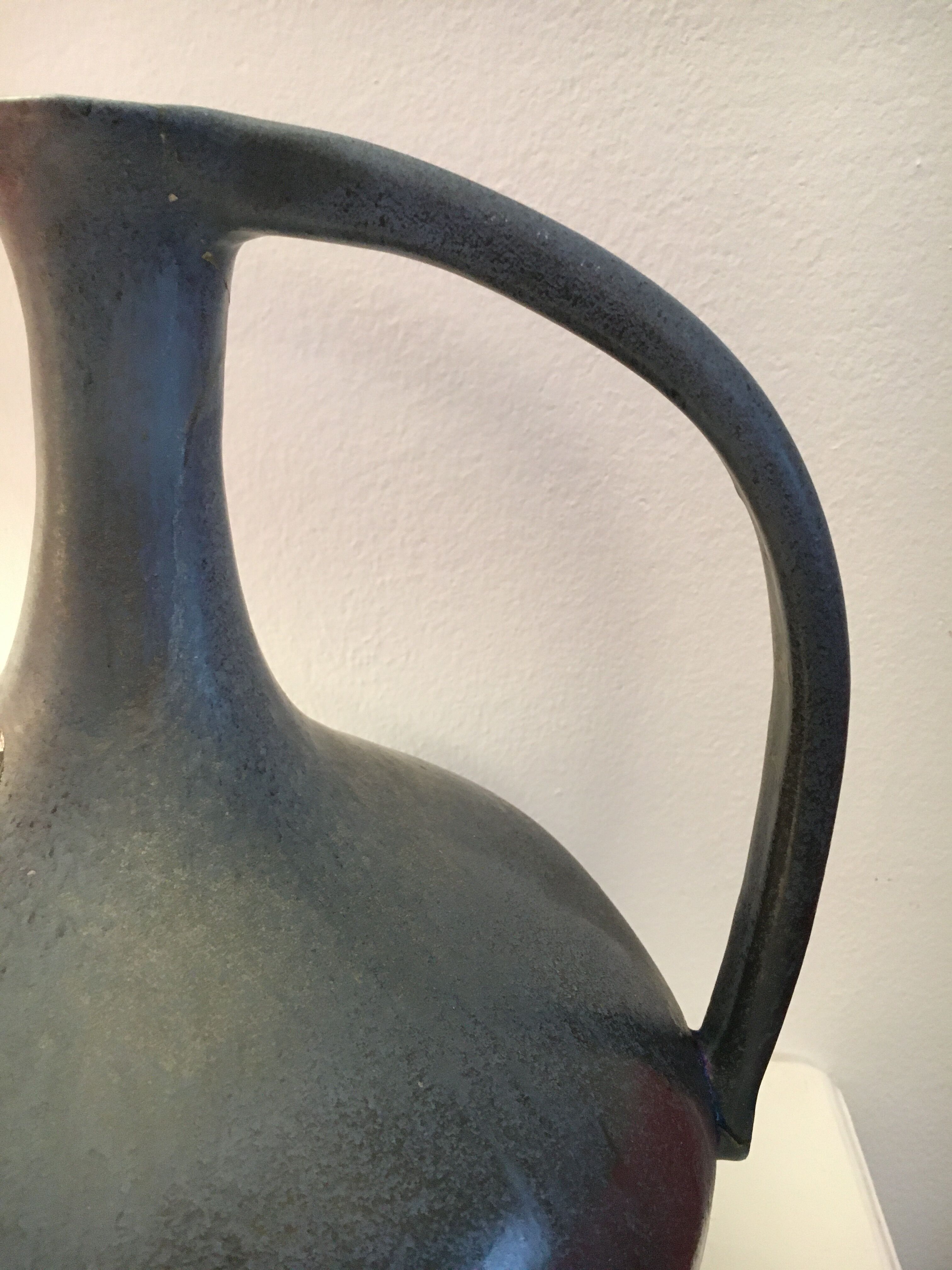 Vase with vintage Scandinavian blue ceramic handles. Signed Lienau