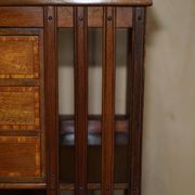 Restored Victorian walnut revolving library.