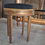 Golden wooden piano stool